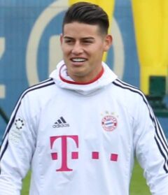 James Rodríguez, Colombian footballer born in 1991, in action on the field.