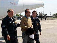 Salvatore Mancuso escorted by DEA agents during 2008 extradition