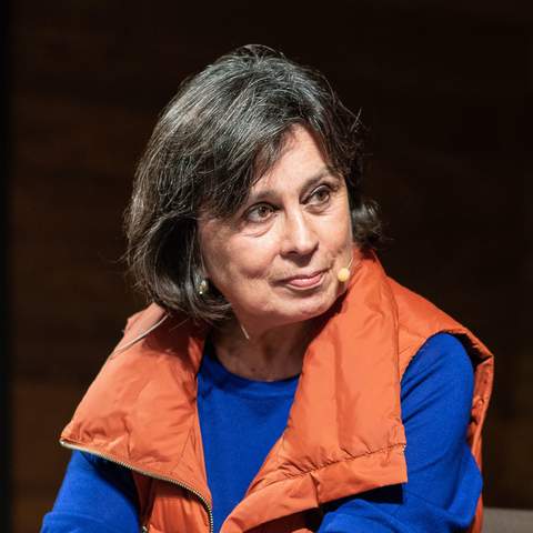 Laura Restrepo speaking at a literary festival in 2018