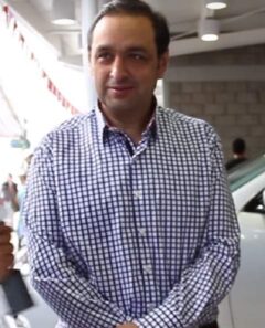 Jorge Alfredo Vargas posing for a portrait in 2014